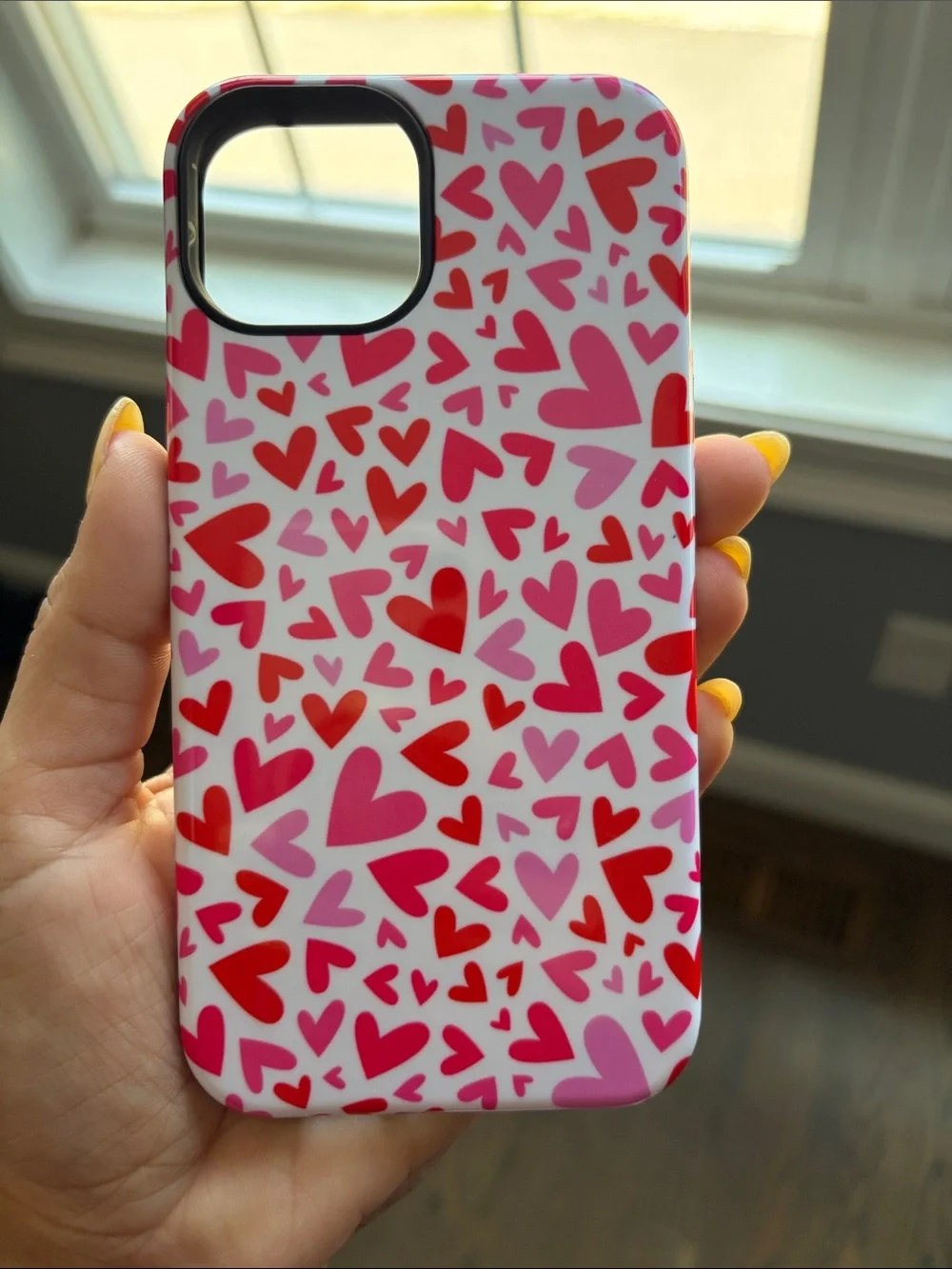 Casely XOXO Candy Heart Case. iPhone 14.